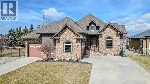 213 E 350 S, Raymond, AB - Outdoor With Facade