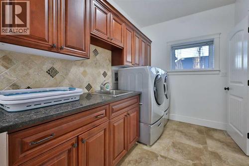 213 E 350 S, Raymond, AB - Indoor Photo Showing Laundry Room