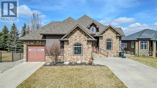 213 E 350 S, Raymond, AB - Outdoor With Facade