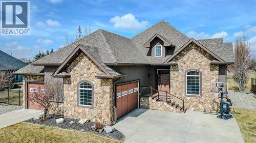 213 E 350 S, Raymond, AB - Outdoor With Facade