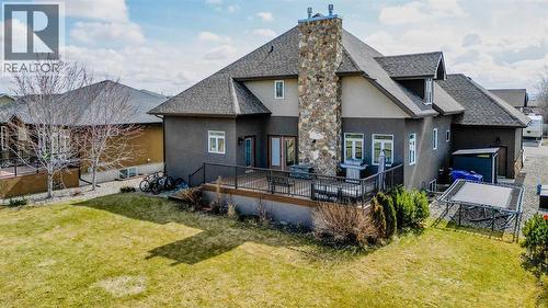 213 E 350 S, Raymond, AB - Outdoor With Deck Patio Veranda