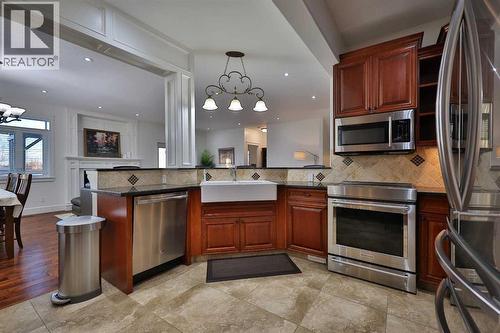 213 E 350 S, Raymond, AB - Indoor Photo Showing Kitchen With Stainless Steel Kitchen With Upgraded Kitchen
