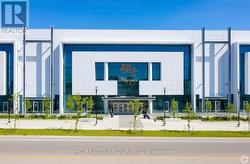 2E11 & 12 - 9390 WOODBINE AVENUE  Markham, ON L6C 0M5