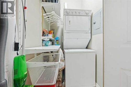 203, 11170 30 Street Sw, Calgary, AB - Indoor Photo Showing Laundry Room