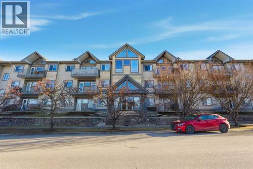 203, 11170 30 Street Sw, Calgary, AB - Outdoor With Balcony With Facade