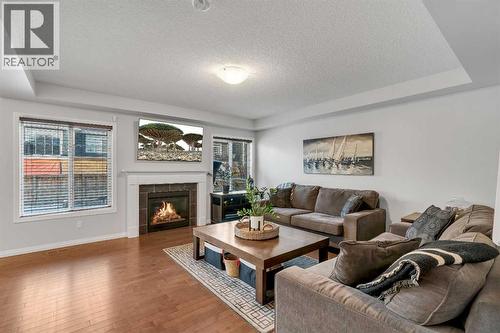 136 Viewpointe Terrace, Chestermere, AB - Indoor Photo Showing Living Room With Fireplace