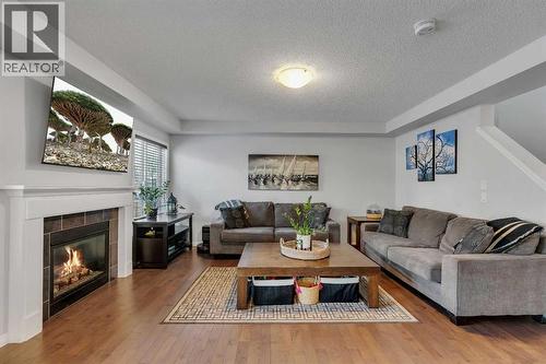 136 Viewpointe Terrace, Chestermere, AB - Indoor Photo Showing Living Room With Fireplace