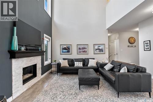 210 Clubhouse Boulevard, Warman, SK - Indoor Photo Showing Living Room With Fireplace
