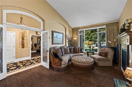 3992 Gallaghers Parkway, Kelowna, BC - Indoor Photo Showing Other Room With Fireplace