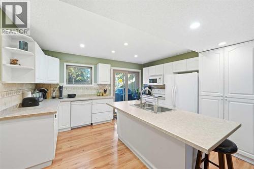 23, 1225 Railway Avenue, Canmore, AB - Indoor Photo Showing Kitchen With Double Sink