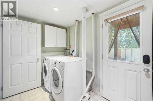 23, 1225 Railway Avenue, Canmore, AB - Indoor Photo Showing Laundry Room