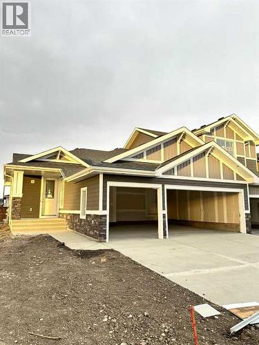277 Waterford Way, Chestermere, AB - Outdoor With Facade