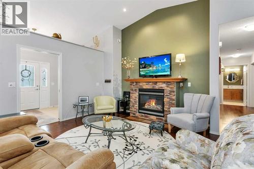 605 5 Street Sw, Sundre, AB - Indoor Photo Showing Living Room With Fireplace