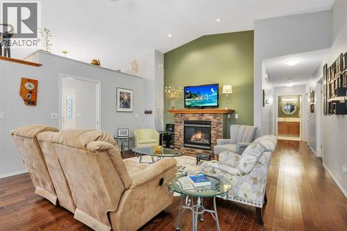 605 5 Street Sw, Sundre, AB - Indoor Photo Showing Living Room With Fireplace