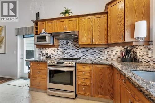 605 5 Street Sw, Sundre, AB - Indoor Photo Showing Kitchen With Upgraded Kitchen