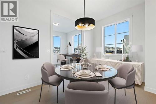 299 Waterford Heights, Chestermere, AB - Indoor Photo Showing Dining Room