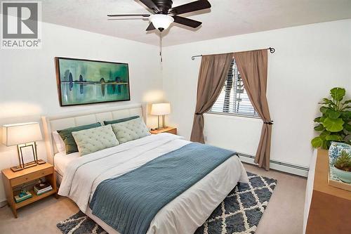 2106, 20 Harvest Rose Park Ne, Calgary, AB - Indoor Photo Showing Bedroom