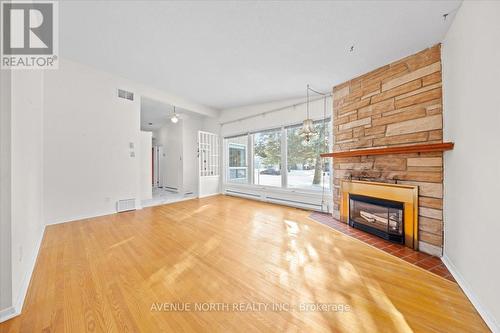 24 Parkmount Crescent, Ottawa, ON - Indoor Photo Showing Other Room With Fireplace