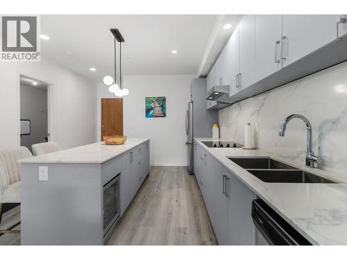 880 Saucier Avenue Unit# 207, Kelowna, BC - Indoor Photo Showing Kitchen With Double Sink With Upgraded Kitchen