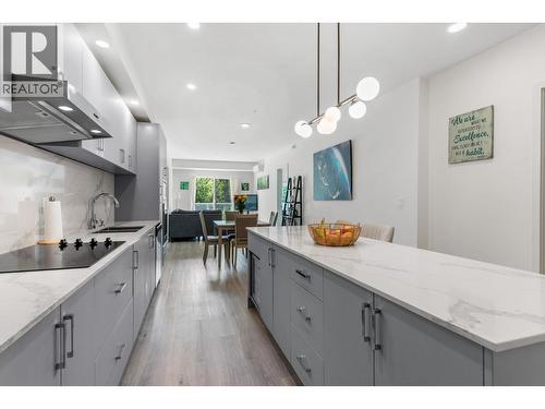 880 Saucier Avenue Unit# 207, Kelowna, BC - Indoor Photo Showing Kitchen With Upgraded Kitchen