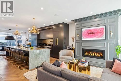 OPEN PLAN WITH HIGH CEILINGS AND HUGE WINDOWS FRONT AND BACK - 3813 1A Street Sw, Calgary, AB - Indoor Photo Showing Living Room With Fireplace