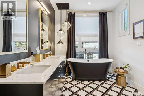 KATERYN CAST IRON SOAKING TUB. GREAT NATURAL LIGHT - 3813 1A Street Sw, Calgary, AB - Indoor Photo Showing Bathroom