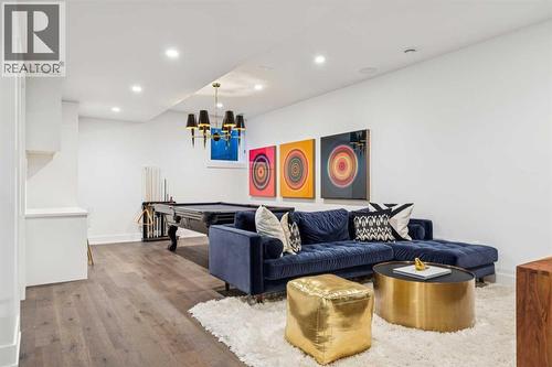 LOWER LEVEL WITH HEATED HARDWOOD FLOORS - 3813 1A Street Sw, Calgary, AB - Indoor Photo Showing Other Room