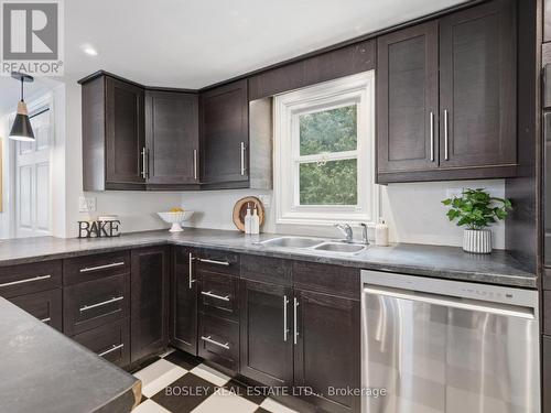 lots of cupboard space - 18 Michigan Avenue, St. Catharines (Port Dalhousie), ON - Indoor Photo Showing Kitchen With Double Sink