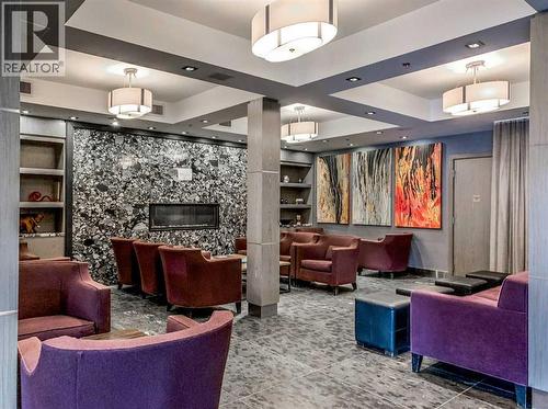 326 Rot. Ef, 901 Mountain Street, Canmore, AB - Indoor With Fireplace