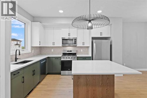 191 Belvedere Crescent Se, Calgary, AB - Indoor Photo Showing Kitchen With Double Sink With Upgraded Kitchen