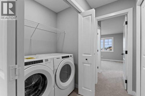 191 Belvedere Crescent Se, Calgary, AB - Indoor Photo Showing Laundry Room