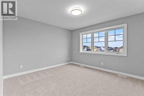 191 Belvedere Crescent Se, Calgary, AB - Indoor Photo Showing Other Room