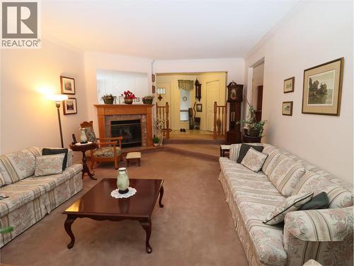 179/173 Chase Road, Christina Lake, BC - Indoor Photo Showing Living Room With Fireplace