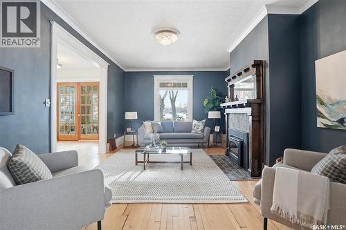 702 Queen Street, Saskatoon, SK - Indoor Photo Showing Living Room With Fireplace