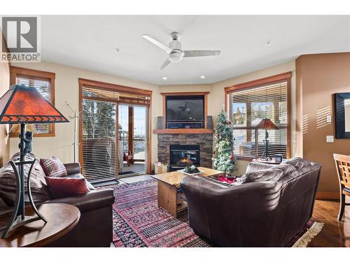 5050 Snowbird Way Unit# 306, Big White, BC - Indoor Photo Showing Living Room With Fireplace