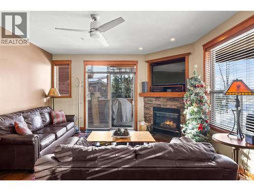 5050 Snowbird Way Unit# 306, Big White, BC - Indoor Photo Showing Living Room With Fireplace