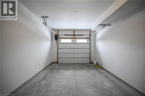 Insulated garage with garage door opener. - 45B Howard Street, Hagersville, ON - Indoor Photo Showing Garage