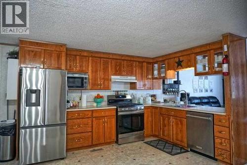 15458 Township Road 1064B, Rural Mackenzie County, AB - Indoor Photo Showing Kitchen With Double Sink