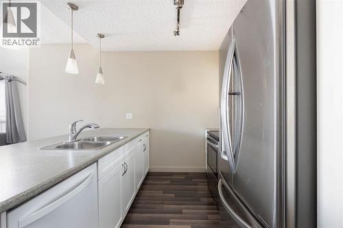 504, 136A Sandpiper Road, Fort Mcmurray, AB - Indoor Photo Showing Kitchen With Double Sink