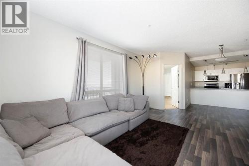 504, 136A Sandpiper Road, Fort Mcmurray, AB - Indoor Photo Showing Living Room