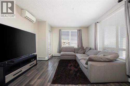 504, 136A Sandpiper Road, Fort Mcmurray, AB - Indoor Photo Showing Living Room