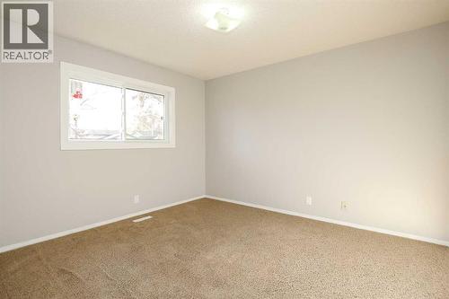 Primary Bedroom - 69 Erickson Drive, Red Deer, AB - Indoor Photo Showing Other Room