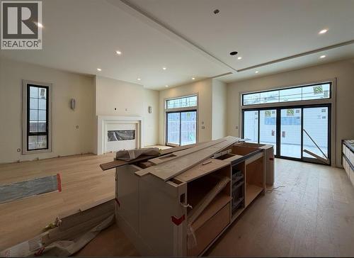 2034 49 Avenue Sw, Calgary, AB - Indoor Photo Showing Other Room With Fireplace