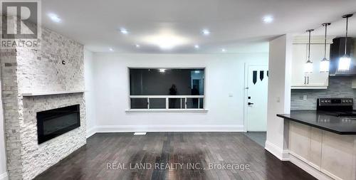 132 Edgecroft Road, Toronto, ON - Indoor Photo Showing Living Room With Fireplace