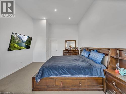 Bedroom featuring a towering ceiling, carpet, and recessed lighting - 144 Summit Ridge Drive, Guelph, ON - Indoor Photo Showing Bedroom