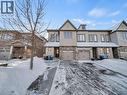 View of front facade featuring a garage - 144 Summit Ridge Drive, Guelph, ON  - Outdoor With Facade 