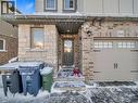Snow covered property entrance featuring stone siding - 144 Summit Ridge Drive, Guelph, ON  - Outdoor 