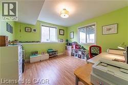 Office area with light wood-style flooring - 