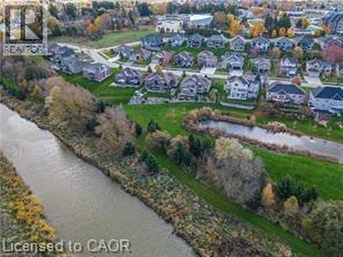 View of property location with a nearby body of water and nearby suburban area - 158 River Run Road, Drayton, ON - Outdoor With Body Of Water With View