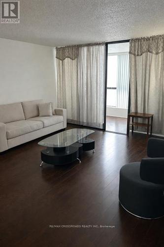 209 - 8 Silverbelle Grove, Toronto, ON - Indoor Photo Showing Living Room